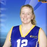 Head-and-shoulders portrait of a smiling player in a blue and gold representative jersey.